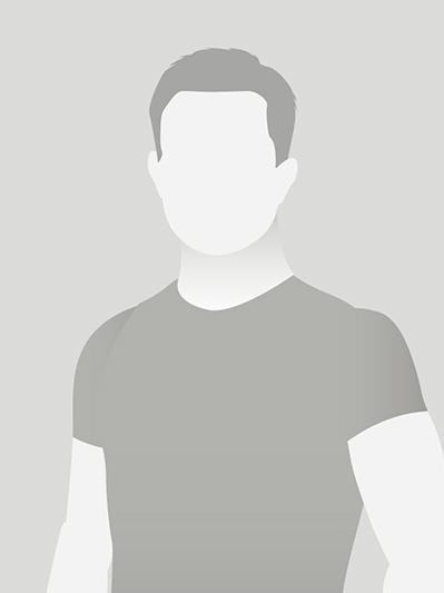 Undefinierte Silhouette eines Mannes in einem schlichten, grauen Hintergrund.